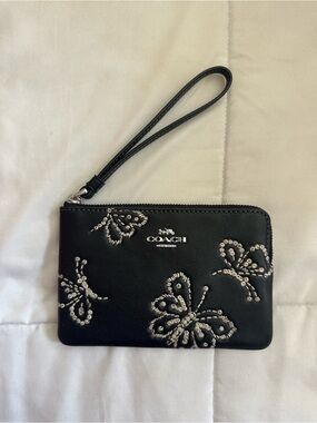 COACH Black Butterfly Studded Leather Wristlet